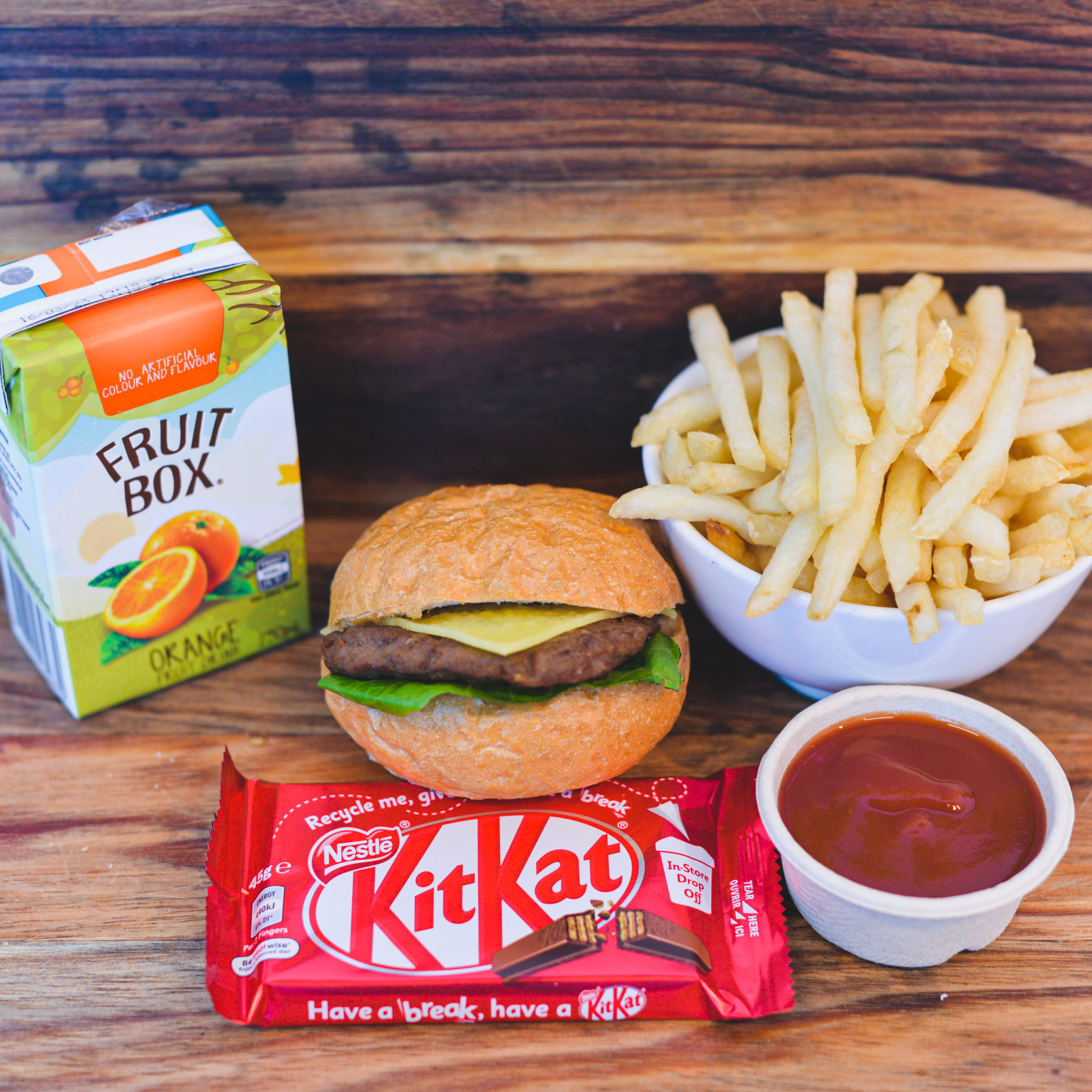 Cheese Burger, Large French Fries, sauce, chocolate bar and juice ($50.00)