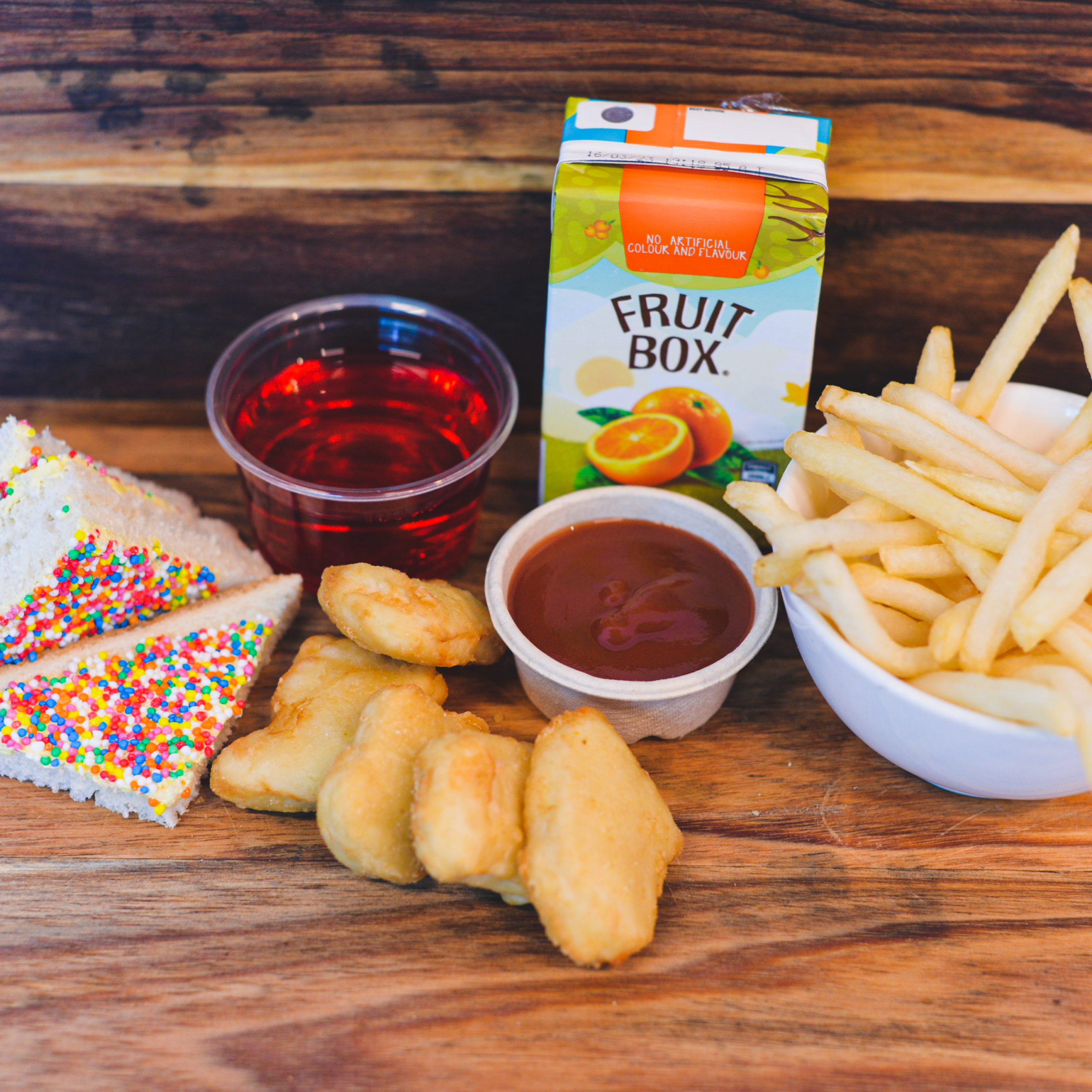 Chicken Nuggets, small French Fries, sauce, Fairy Bread, Jelly and juice box ($38.00)